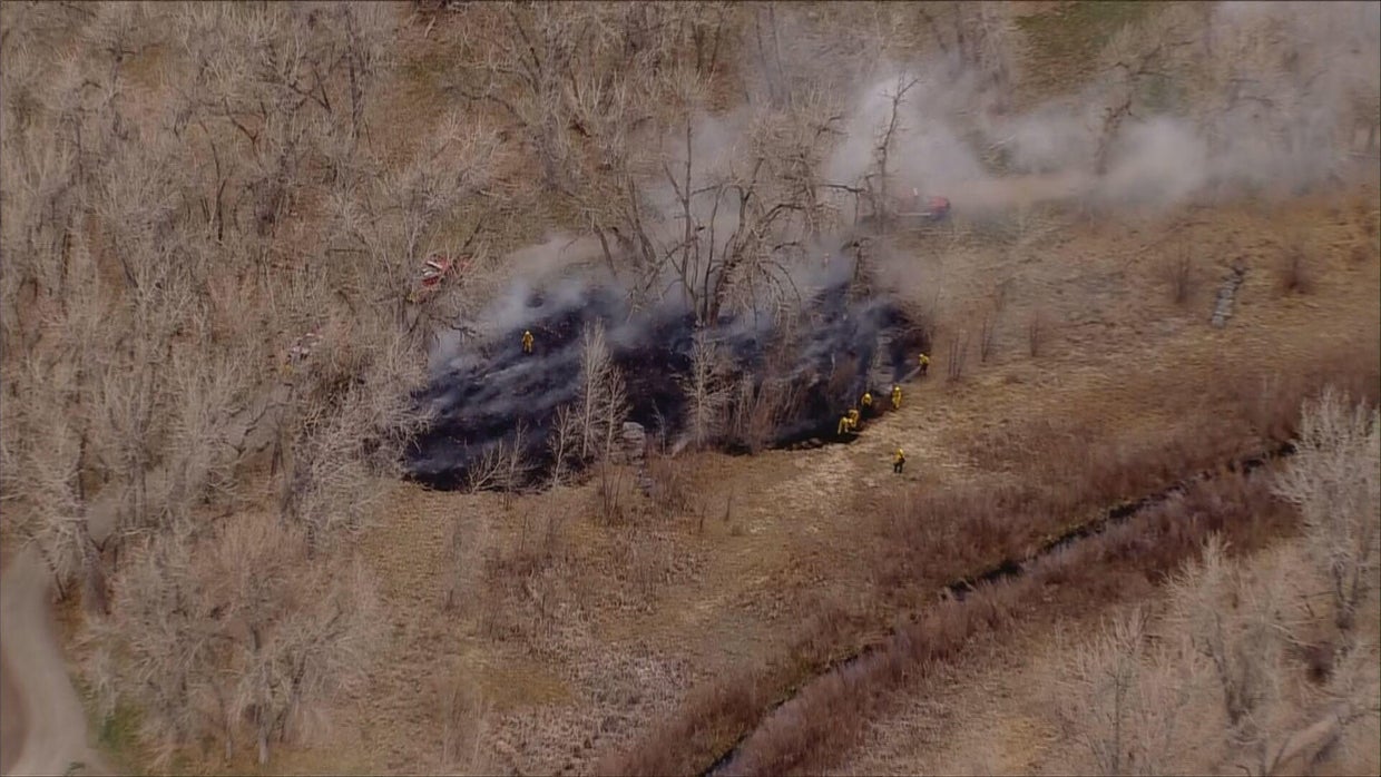Fire crews battle brush fire burning along Cherry Creek Trail near ...