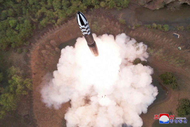 A view of a test launch of a new solid-fuel intercontinental ballistic missile (ICBM) Hwasong-18 
