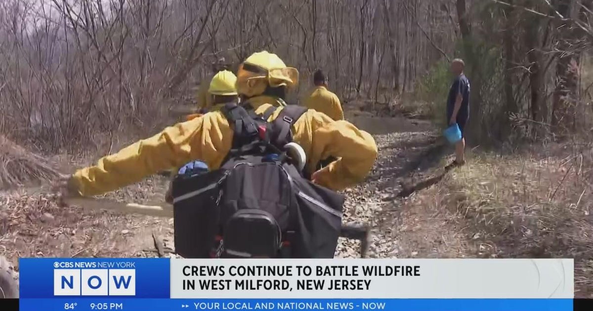 Crews continue to battle wildfire in West Milford - CBS New York