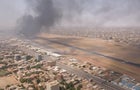 Smoke rises over the city as army and paramilitaries clash in power struggle, in Khartoum 