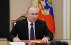 Russian President Vladimir Putin chairs a meeting with members of the Security Council via video link in Moscow, Russia, April 14, 2023. 
