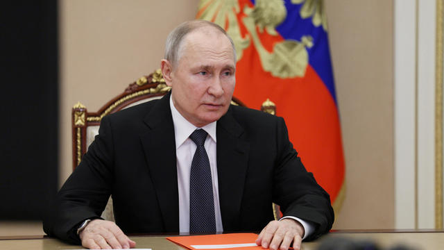 Russian President Vladimir Putin chairs a meeting with members of the Security Council via video link in Moscow, Russia, April 14, 2023. 