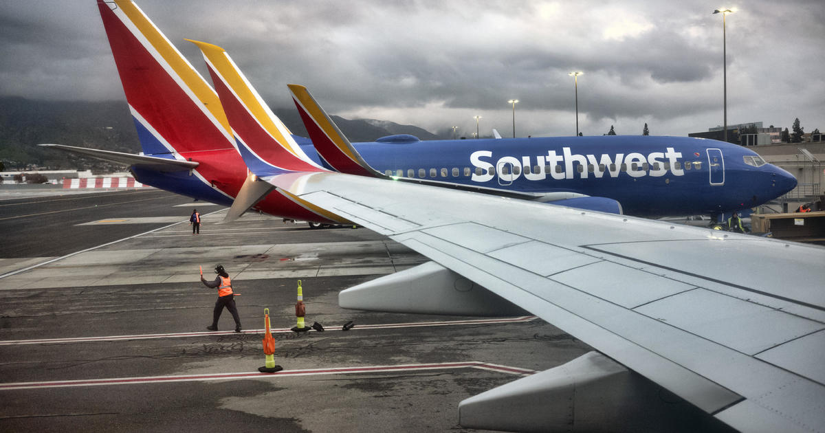 Southwest cancels hundreds of flights, disrupting some holiday travelers