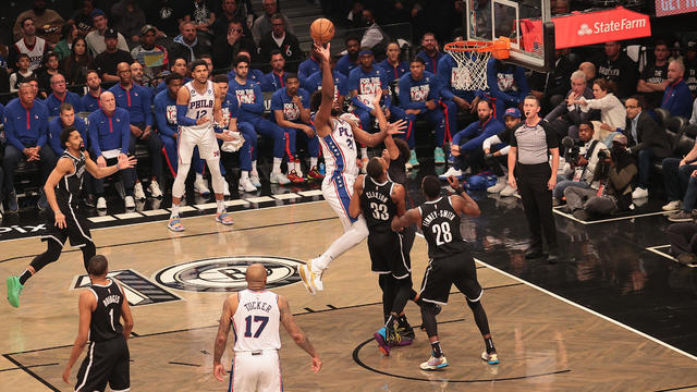 Joel Embiid (21) of Philadelphia 76ers shoots the ball during the game against the Brooklyn Nets at the Barclays Center, Brooklyn, New York City. 