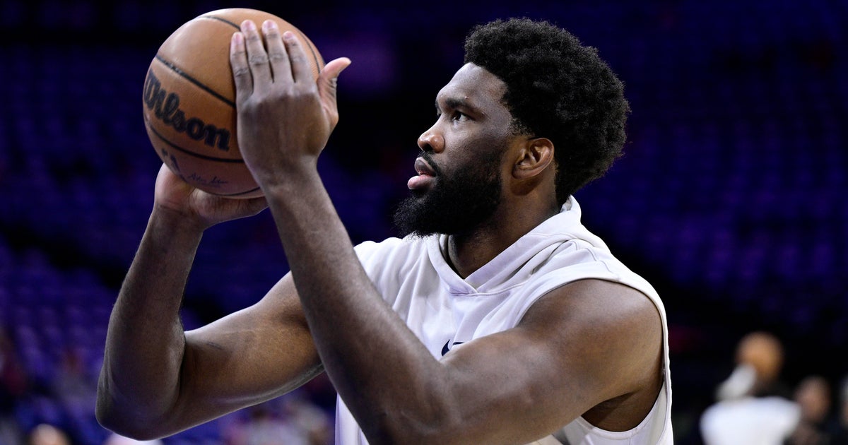 Embiid gets tech but no ejection for groin kick to Claxton - CBS ...