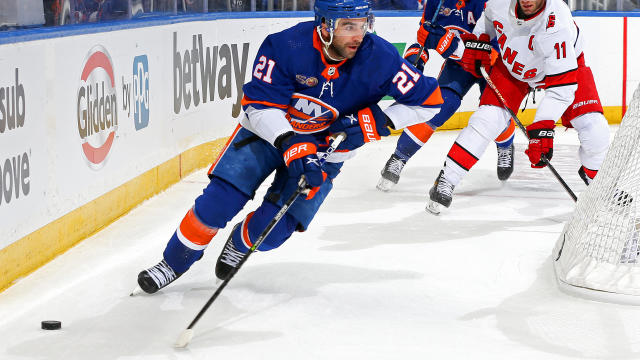Kyle Palmieri #21 of the New York Islanders carries the puck against the Carolina Hurricanes during the first period in Game Three of the First Round of the 2023 Stanley Cup Playoffs at UBS Arena on April 21, 2023 in Elmont, New York. 
