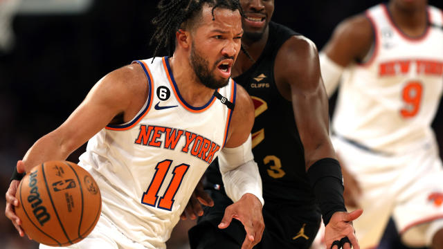 Jalen Brunson #11 of the New York Knicks drives to the basket as Caris LeVert #3 of the Cleveland Cavaliers defends during game three of the Eastern Conference playoffs at Madison Square Garden on April 21, 2023 in New York City. 