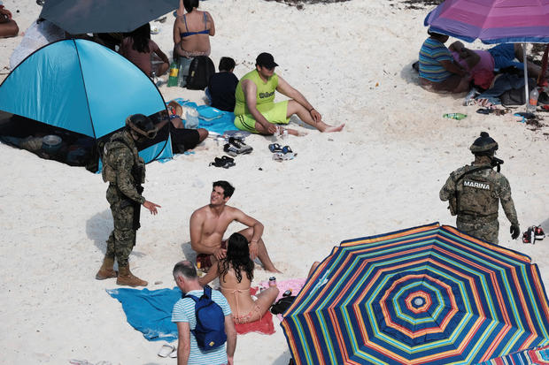 Mexican Marines patrol at Gaviota Azul beach during Holy Week in Cancun 