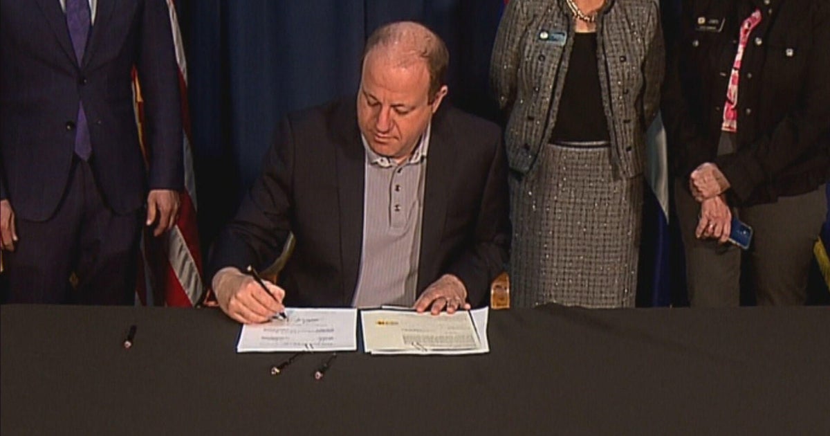 Gov. Jared Polis signs 2 new school safety bills into law - CBS Colorado