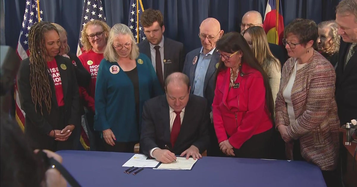 Gov. Jared Polis signs 4 gun safety laws - CBS Colorado