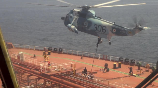 A screengrab from video released on April 28, 2023, by the Iranian navy shows Iranian marines rappelling onto the deck of the Advantage Sweet, a Marshall Islands-flagged oil tanker, in the Gulf of Oman. 