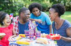 family enjoying a Memorial Day barbecue 