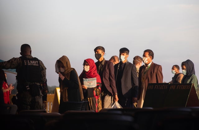 Afghan refugees arrive at the a U.S. naval base in Spain as part of Operation Allies Refuge on Aug. 31, 2021.
