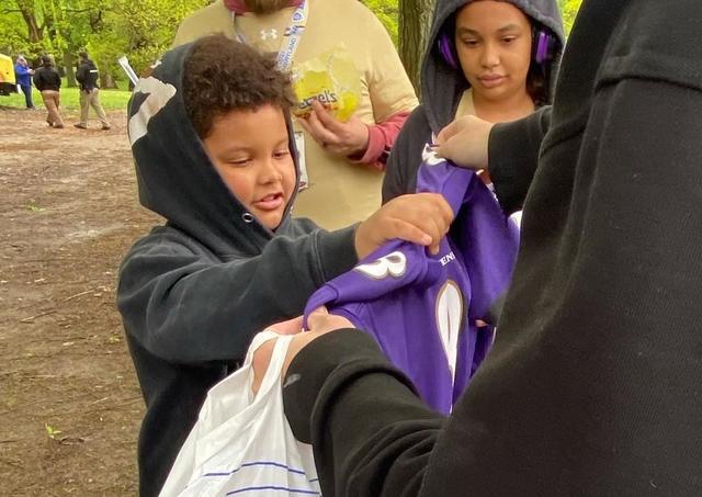 I) do it for the kids': Ravens' fan describes idea behind giving