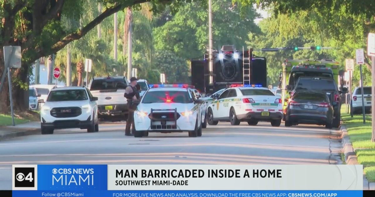 Police in standoff with man barricade in SW Dade home - CBS Miami