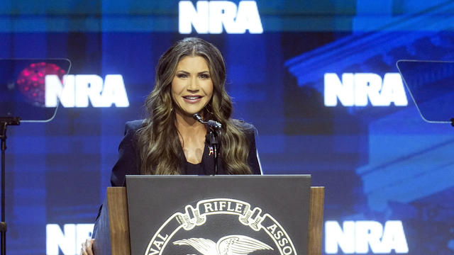 South Dakota Gov. Kristi Noem speaks at the National Rifle Association Convention, Friday, April 14, 2023, in Indianapolis. 