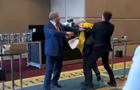 Ukrainian and Russian delegates fight over Ukraine flag 