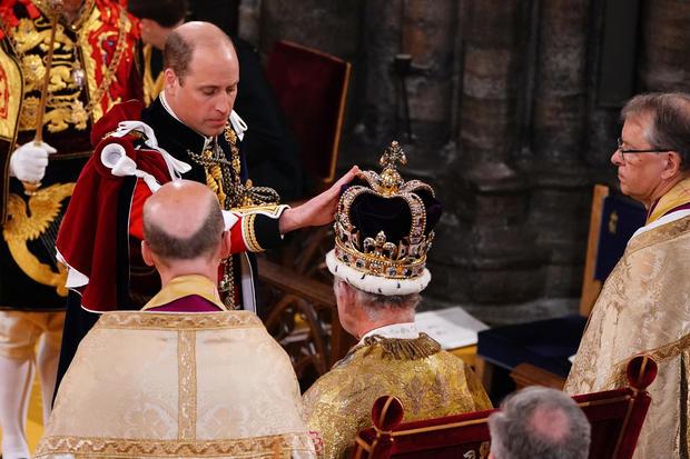 Prince William and King Charles III at the king's coronation ceremony 