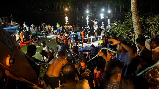 Rescuers search for survivors after a boat capsized off the coastal town of Tanur in the Malappuram district of the southern state of Kerala, India, May 7, 2023. 