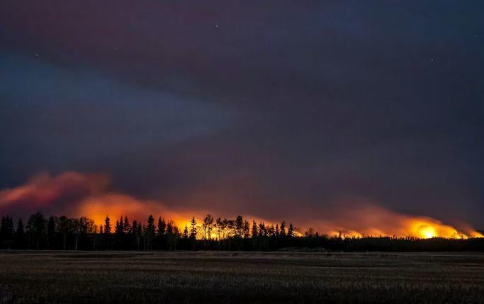 Canada wildfires force evacuation of 30,000 in scorched Alberta - CBS News