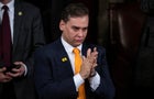 Rep. George Santos, a Republican from New York, applauds during President Biden's State of the Union address in the House chamber of the U.S. Capitol on February 7, 2023. 