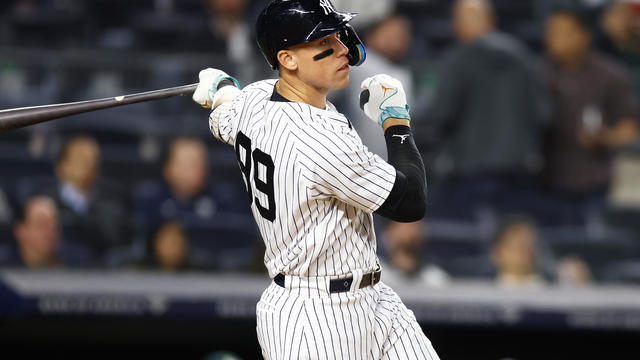 Aaron Judge #99 of the New York Yankees hits an RBI sacrifice fly in the eighth inning against the Oakland Athletics at Yankee Stadium on May 09, 2023 in Bronx, New York. 