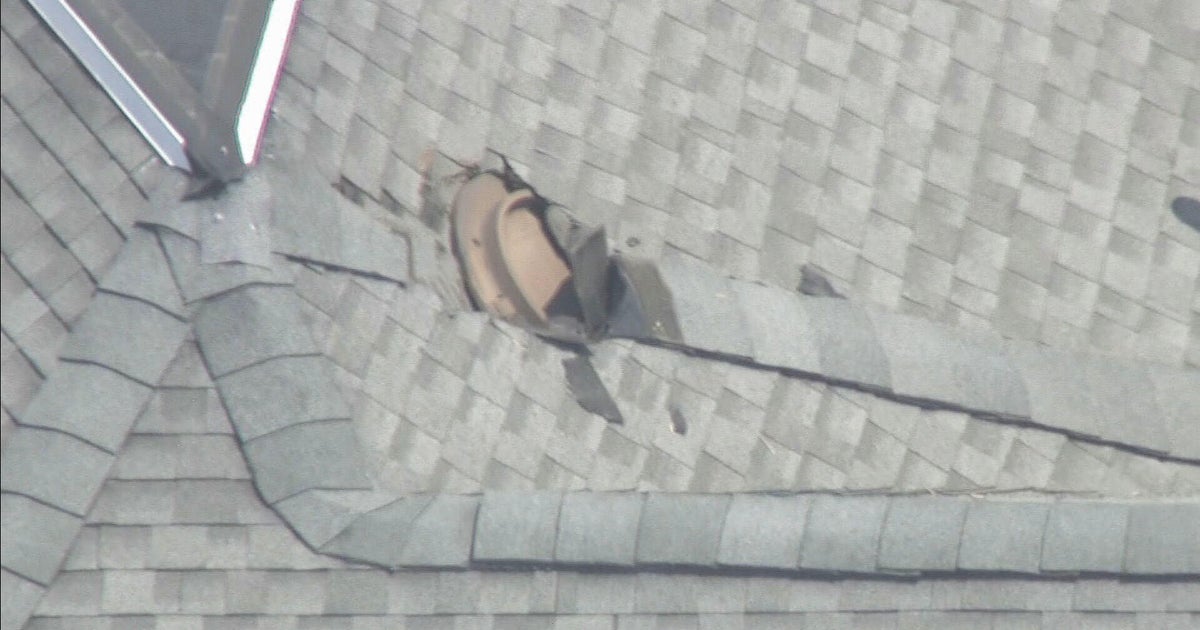 Manhole cover blown out of Somerville street in explosion, lands in