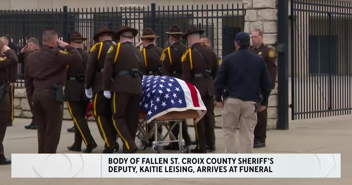 Casket of fallen Wisconsin deputy arrives at Hudson High School Friday morning