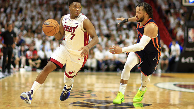 Kyle Lowry #7 of the Miami Heat drives on Jalen Brunson #11 of the New York Knicks during game six of the Eastern Conference Semifinals in the 2023 NBA Playoffs at Kaseya Center on May 12, 2023 in Miami, Florida. 
