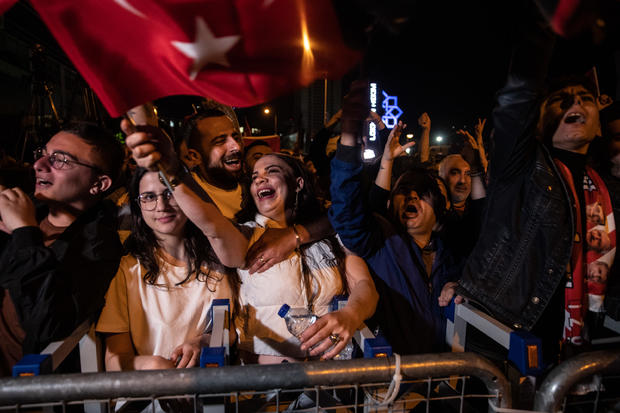 Supporters of Kemal Kilicdaroglu's, presidential candidate of Turkey's main opposition alliance, react after early exit polls at the Republican People's Party (CHP) headquarters on May 14, 2023 in Ankara, Turkey. 