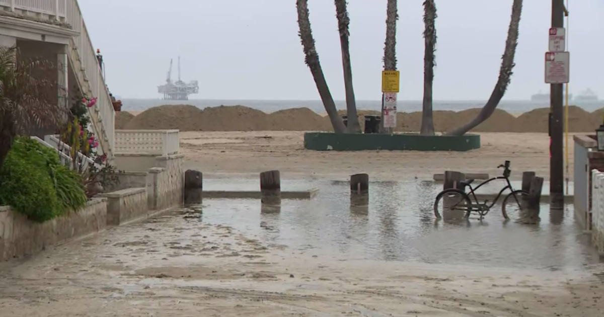 High tides floods streets and parking lots in Seal Beach CBS Los Angeles