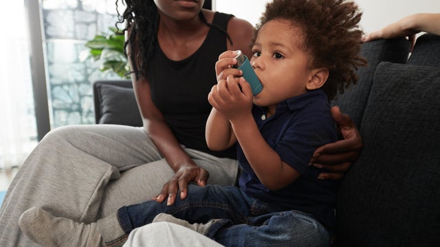 Boy Suffering from Asthmatic Attack 