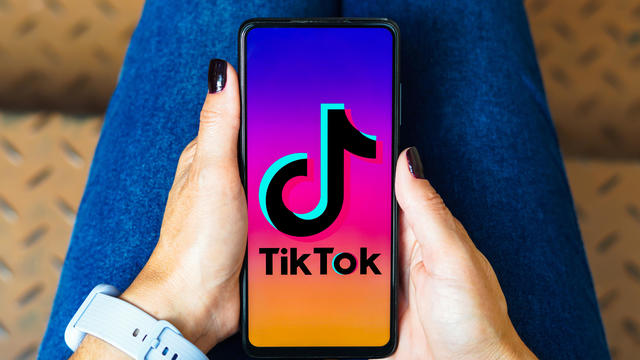In this photo illustration, the TikTok logo is displayed on 