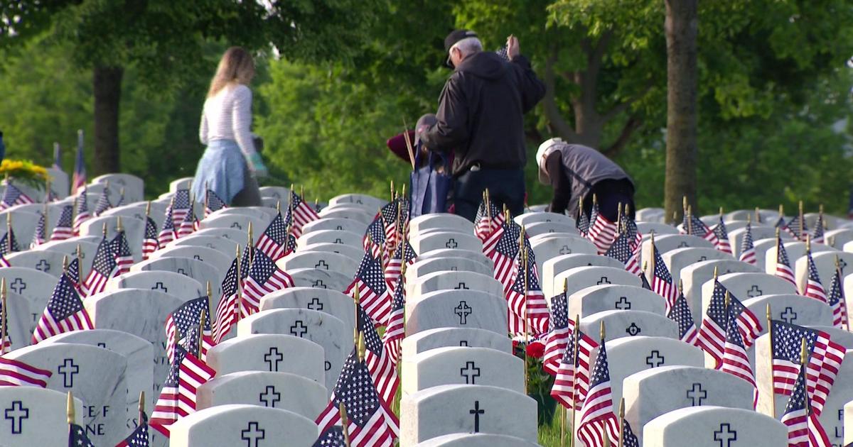 Volunteers prep Fort Snelling National Cemetery for Memorial Day