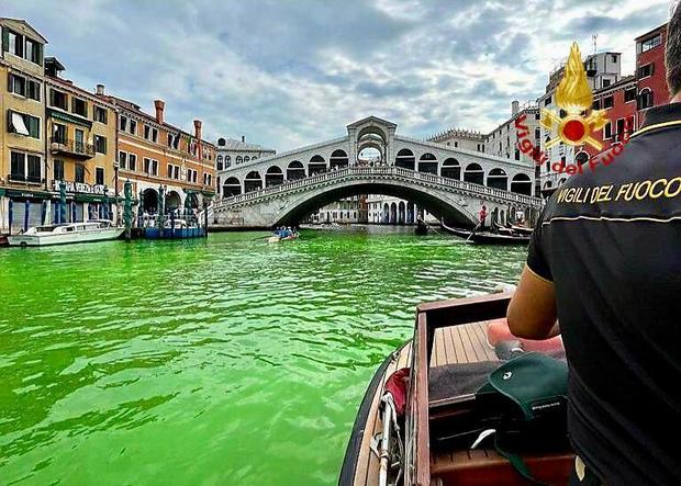 Stretch of Venice's Grand Canal mysteriously turns phosphorescent green