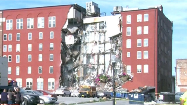 Eight people rescued after 6-story apartment building collapses in  Davenport, Iowa - CBS News