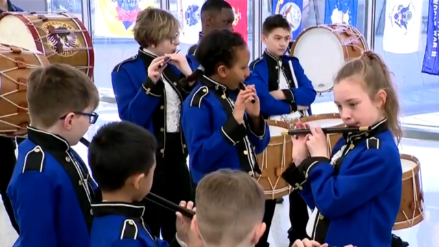Children of the Fife & Drum Corps from Linton Hall School perform. 