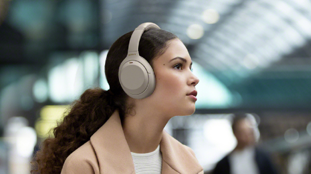 woman wearing Sony headphones 