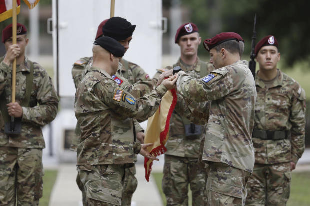 Lt. Gen. Christopher T. Donahue, right, takes part in the Casing of the Colors during a ceremony to rename Fort Bragg as Fort Liberty on June 2, 2023, in Fort Bragg, N.C. 