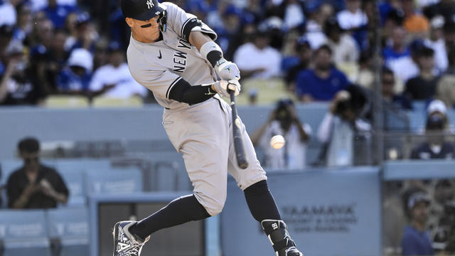 Aaron Judge of the New York Yankees hits a solo home run against the Los Angeles Dodgers in the sixth inning of a baseball game at Dodger Stadium in Los Angeles on Saturday, June 3, 2023. 