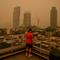 New Yorkers flee indoors as Canadian wildfire smoke smothers city
