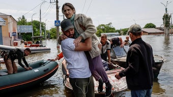 Even rescues risky as Russia bombs Ukraine region flooded by dam break 