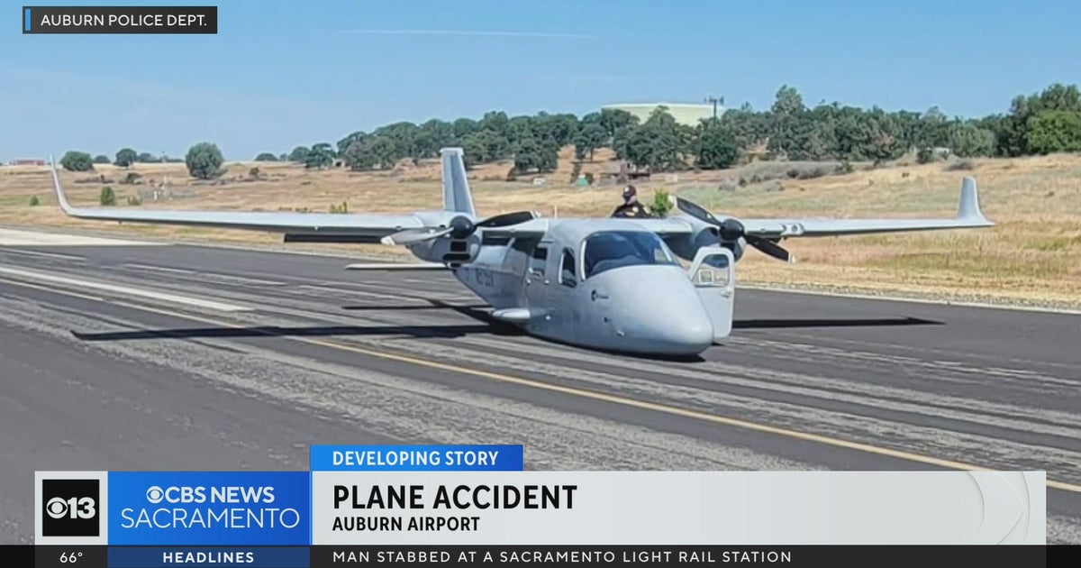 Aircraft landed at the Auburn airport without wheels; investigation underway