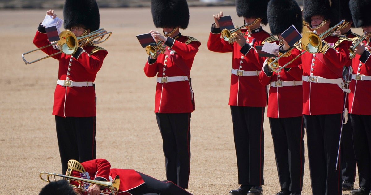 Many of the British guards passed out as Prince William reviewed the military parade