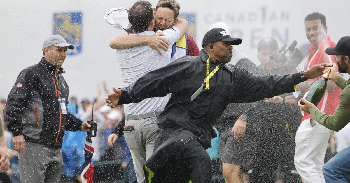 Golfer Adam Hadwin tackled by security while celebrating Nick Taylor's Canadian Open win