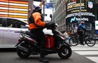 Food delivery driver in Times Square 