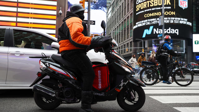 Food delivery driver in Times Square 