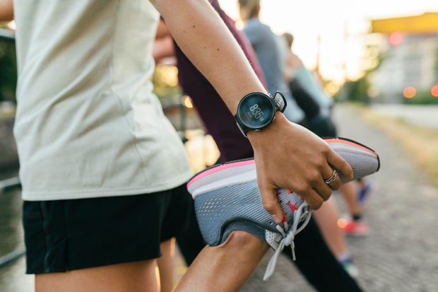 Close up of woman stretching before run