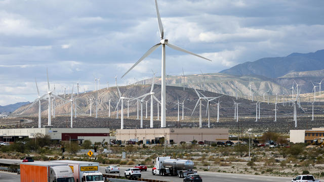 Wind Turbines In California behind a highway 
