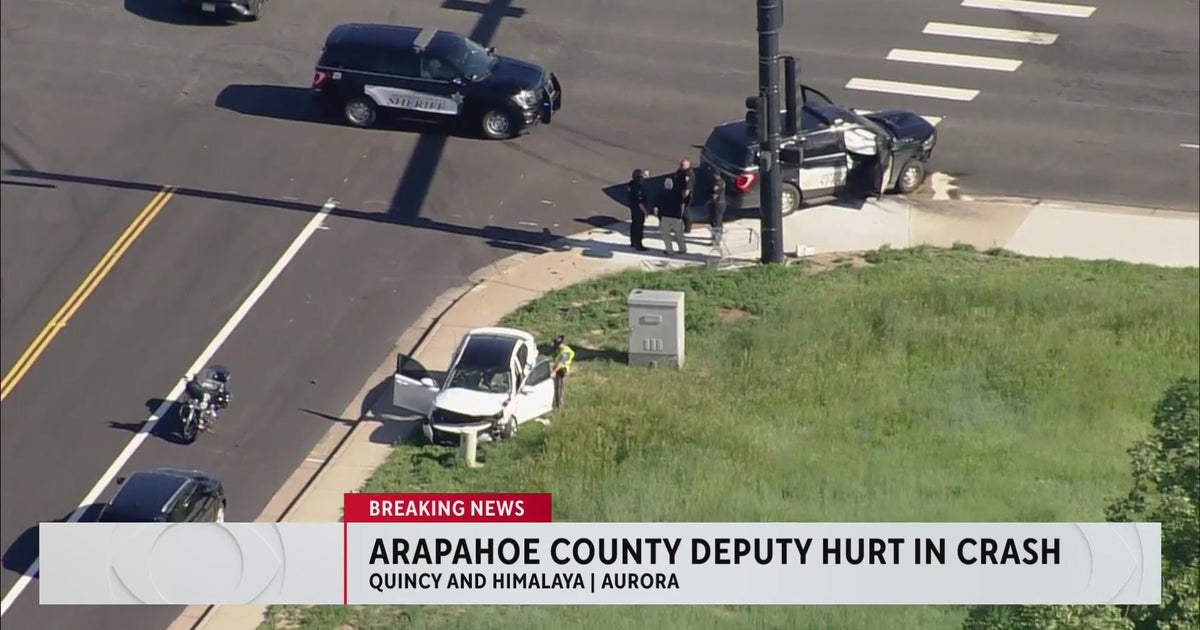 Arapahoe County Sheriff vehicle struck by other car while responding to separate crash CBS